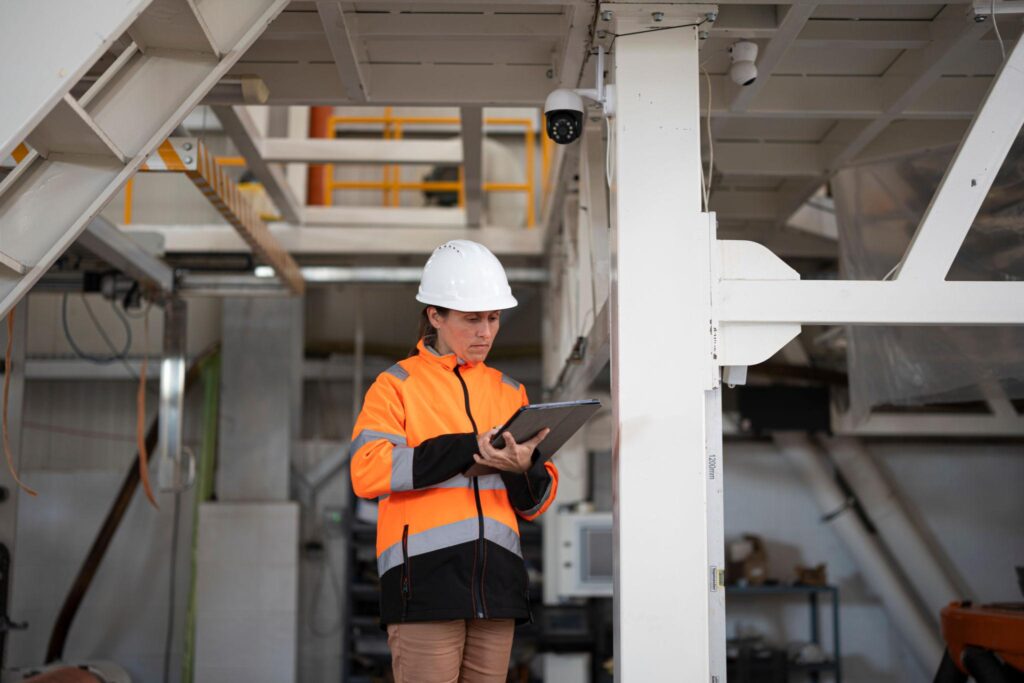 Technician conducting an industrial CCTV site survey